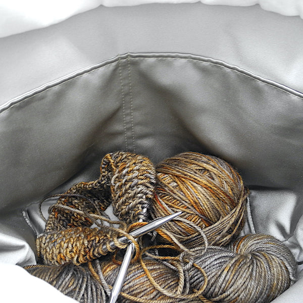 inside basket showing pockets and yarn