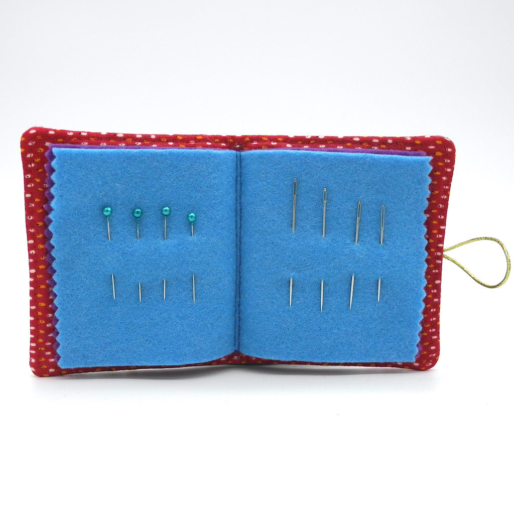 needle book open showing needles