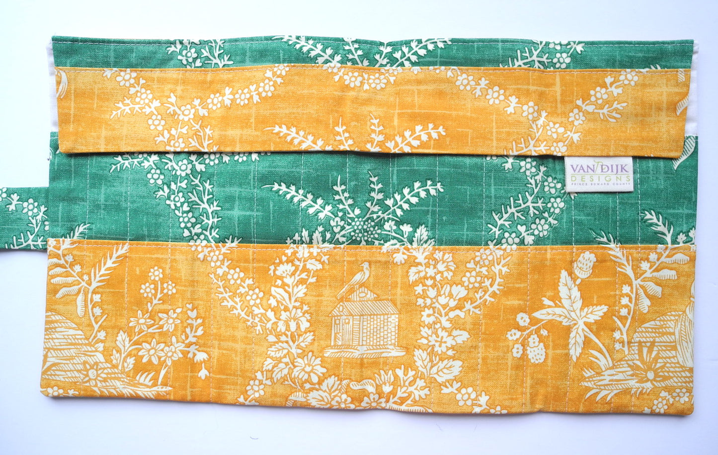 crochet hook organizer opened to show pockets