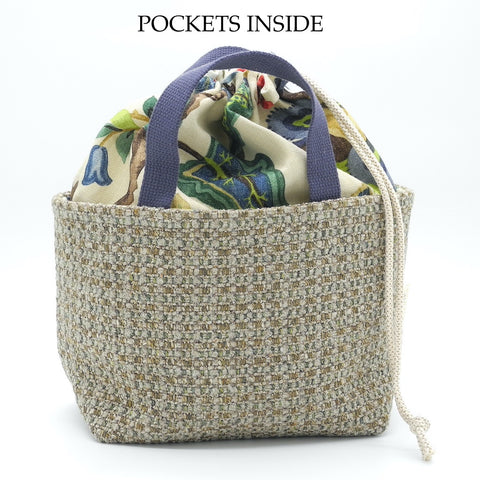 drawstring project basket front view with words pockets inside