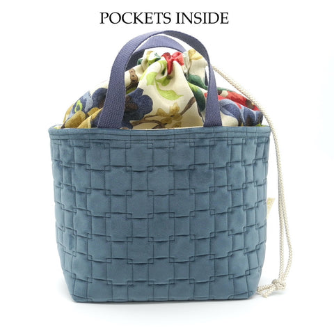 project basket front view with words pockets inside