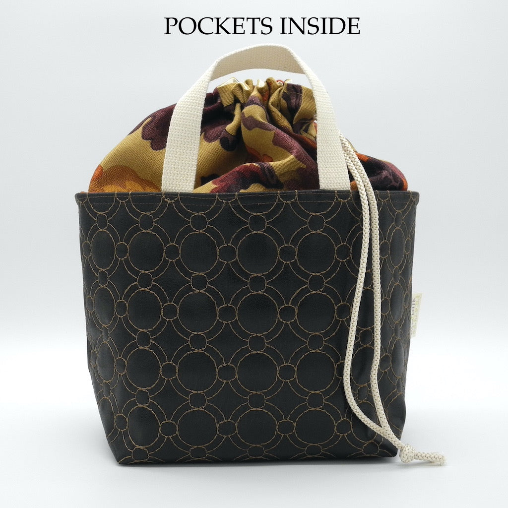 project basket front view with words pockets inside