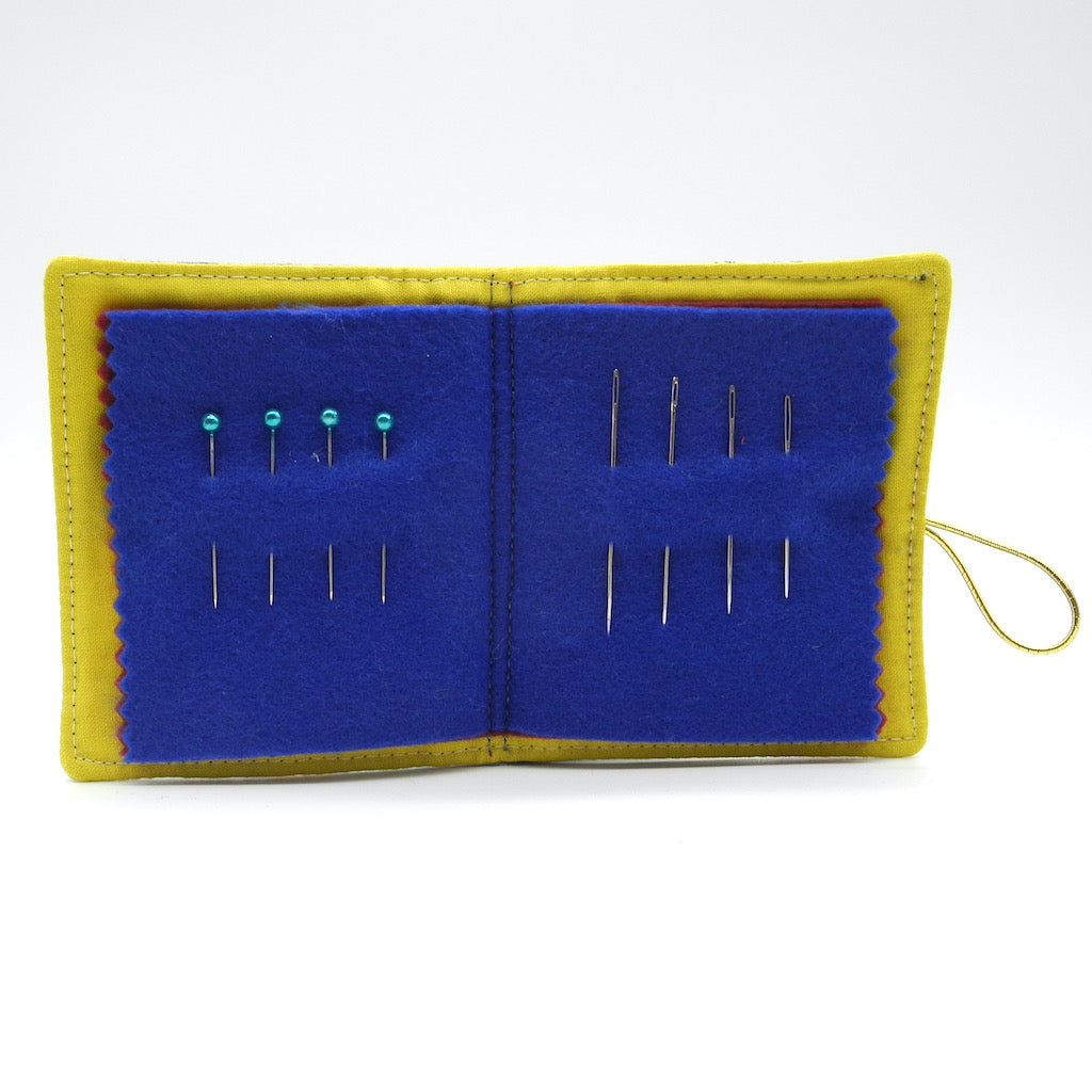 needle book open showing needles