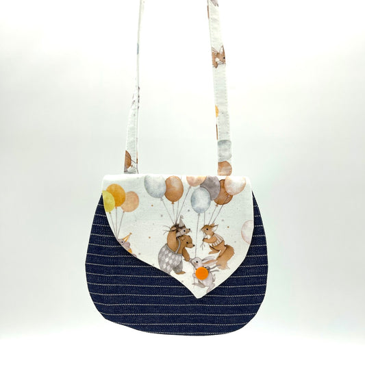 kids cross body purse hanging